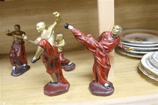 A set of four ceramic figures of boxers